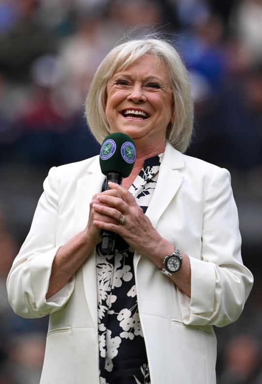 Sue Barker smiling on centre court at Wimbledon