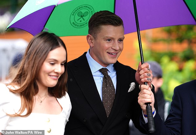 The couple, who were first rumoured to be dating in June 2023, looked in great spirits despite the weather