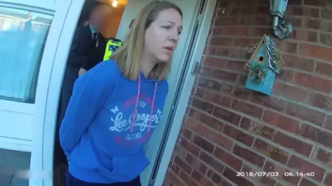 Cheshire Police Letby leaving her home under arrest