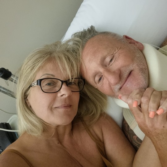 PIC FROM Kennedy News and Media (PIC SHOWS: LOUISE WALKINGTON, 56, AND GARETH WILLIAMS, 60, WHO WAS HOSPITALISED AFTER SUFFERING A BLOCKAGE IN HIS HEART) A holidaymaker thought her new fiance was about to die in her arms - when he collapsed on the dancefloor after popping the question during a romantic holiday. Louise Walkington, who lives in Sittingbourne, Kent, was holidaying with her partner Gareth Williams in Kavos, Corfu, earlier this month when he made a shock marriage proposal a few days into the trip. Gareth - a 60-year-old former housing company foreman - decided to pop the question in the same resort where the pair had met the year before while on holiday. DISCLAIMER: While Kennedy News and Media uses its best endeavours to establish the copyright and authenticity of all pictures supplied, it accepts no liability for any damage, loss or legal action caused by the use of images supplied and the publication of images is solely at your discretion. SEE KENNEDY NEWS COPY - 0161 697 4266