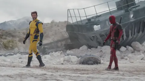 Disney Wolverine (L) and Deadpool (R)