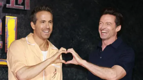 Getty Images Ryan Reynolds and Hugh Jackman