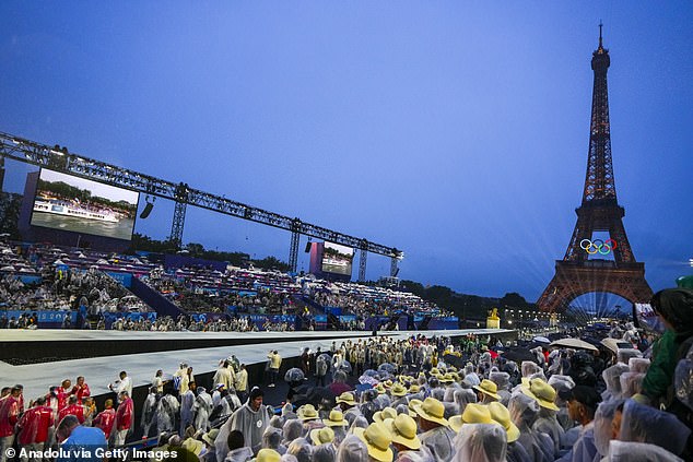 Australian viewers were left confused when they tuned in to watch the hotly-anticipated 2024 Paris Olympics on Saturday (participants are seen gathering around the Seine River)