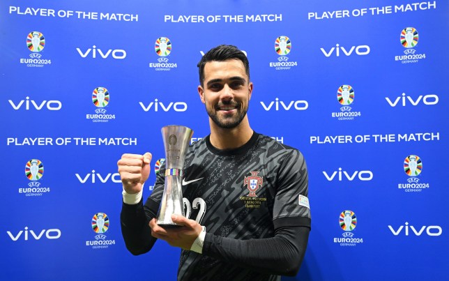 Diogo Costa of Portugal poses for a photo with the Vivo Player of the Match award after the team's victory in the penalty shoot out during the UEFA EURO 2024 round of 16 match between Portugal and Slovenia at Frankfurt Arena