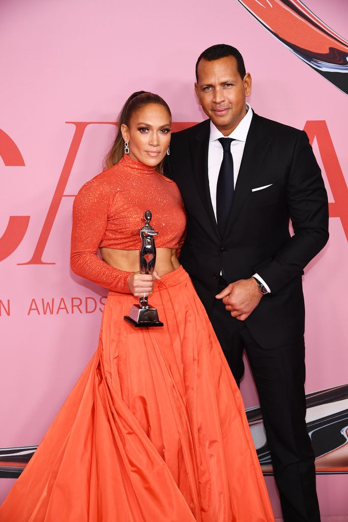 Jennifer Lopez poses with the Fashion Icon Award and Alex Rodriguez during Winners Walk during the CFDA Fashion Awards at the Brooklyn Museum of Art on June 03, 2019 in New York City.