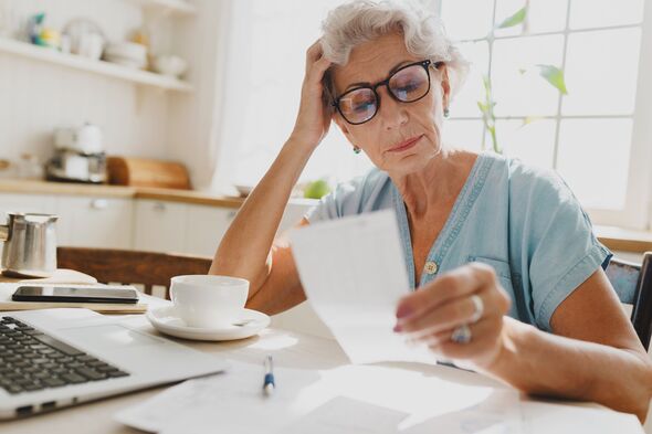 Senior woman looking over her finances