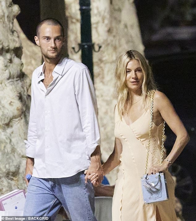 The actress, 42, and her partner, 27, appeared in good spirits as they walked hand-in-hand through the French coastal town, after enjoying a spot of shopping