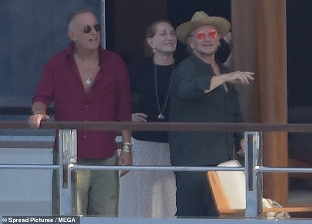 Bruce Springsteen teased some chest hair in a daddy chic look on Friday as he went yachting with pals Steven Spielberg, Bono and U2 guitarist The Edge in Saint-Jean-Cap-Ferrat, France