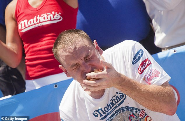 Hitting rates of 7.6 hotdogs per minute, Joey Chestnut has a consumption rate similar to that of a grizzly bear