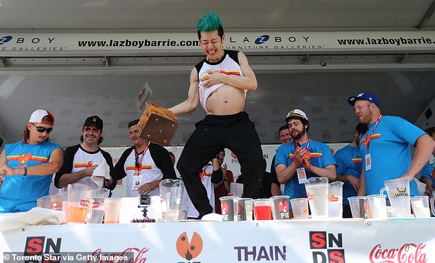 During a competition, a competitor's stomach can stretch to more than four times its normal size to accommodate the food. In this photo, you can clearly see how distended Kobayashi's stomach is after eating over 15lbs of pizza