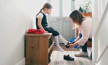 girl getting ready for school