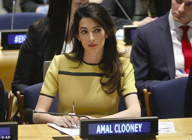 Amal Clooney listens during a human rights meeting at UN headquarters in 2017