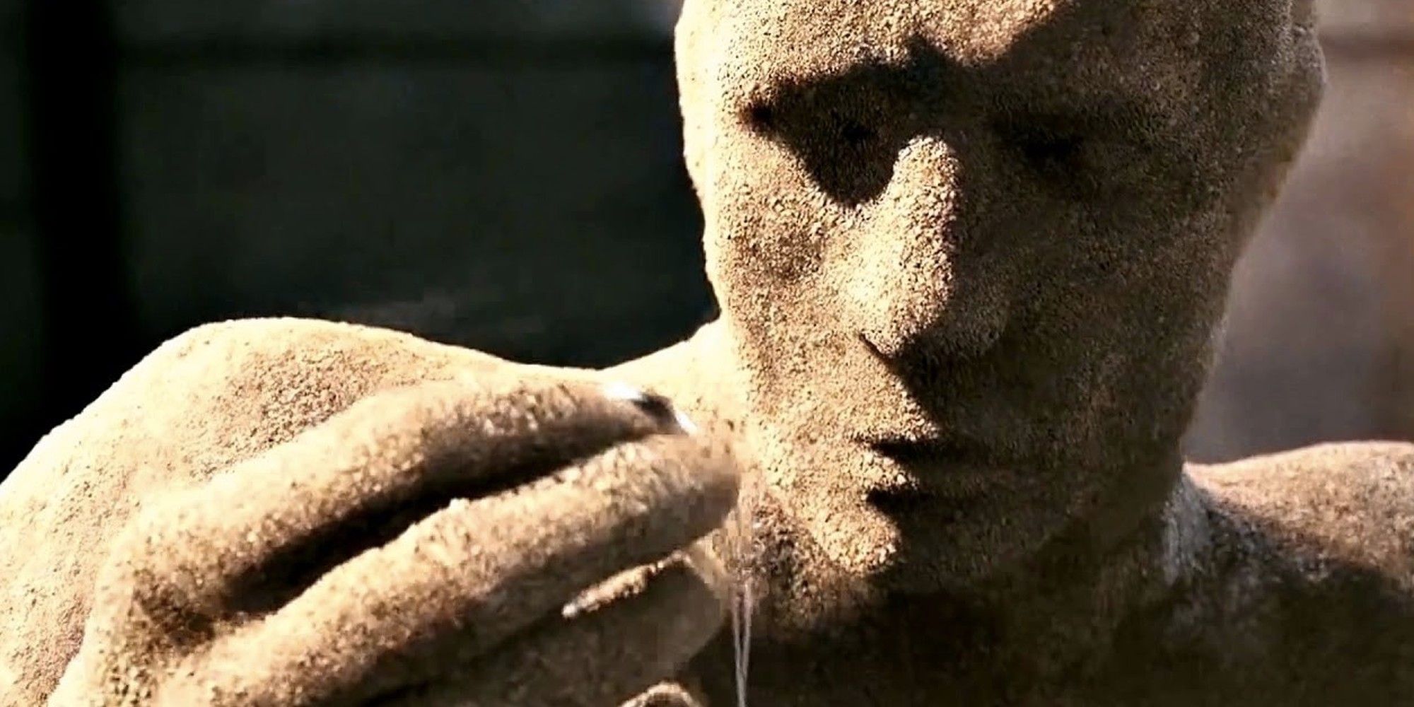 Sandman in his sand form looking at his hand in 'Spider-Man 3'