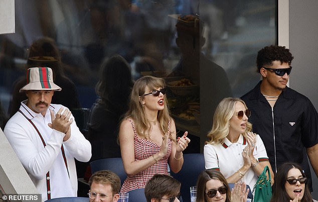 Brittany and Travis appeared to be wearing matching Gucci outfits at the game