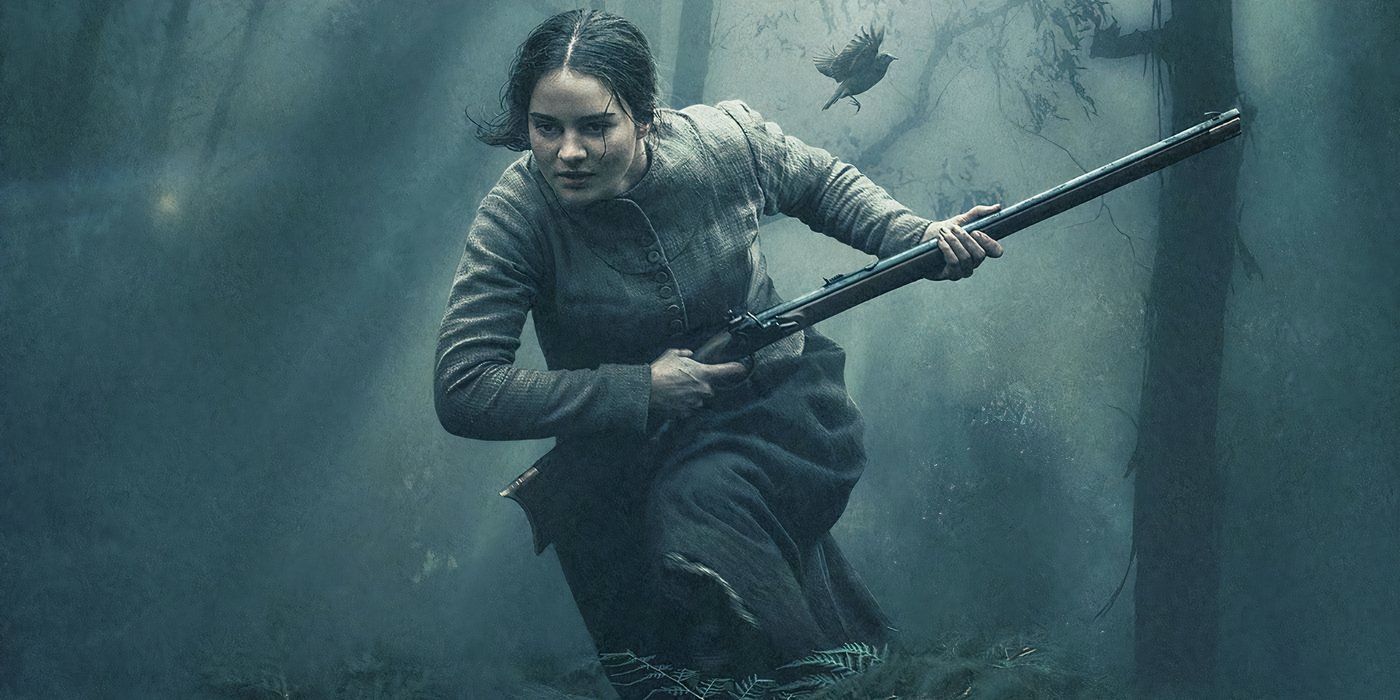 Claire (Aisling Franciosi) runs through a misty forest carrying a musket in The Nightingale.