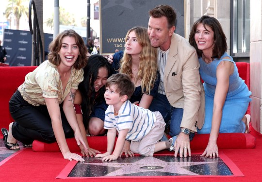 Clara McGregor, Jamyan McGregor, Esther Rose McGregor. Ewan McGregor, Laurie McGregor and Mary Elizabeth Winstead pose with their hands on Ewan's Hollywood Walk of Fame star