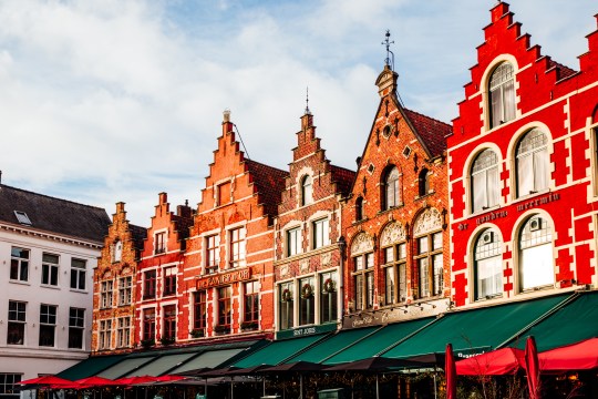 Colourful houses at Grote Markt square in Bruges, Belgium