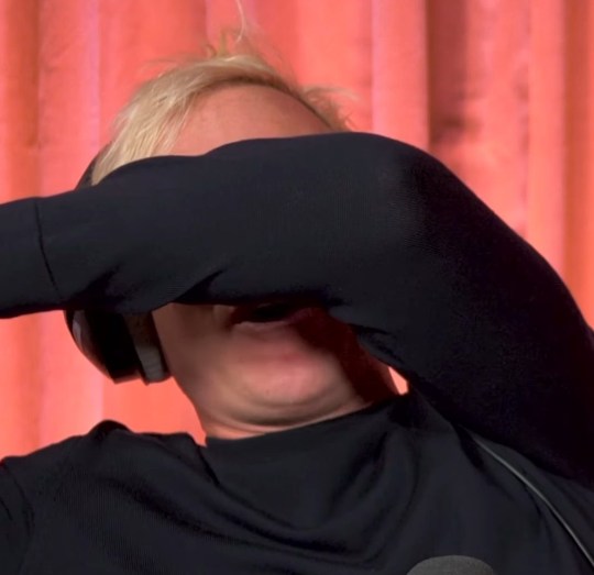 Jamie Laing with his arm over his face 