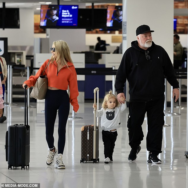 Kyle looked travel ready as he sported a black hoodie and baggy tracksuit bottoms, which he paired with a pair of comfortable trainers