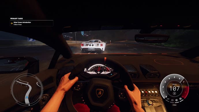 Test Drive Unlimited Solar Crown screenshot showing a race against a Ford GT from inside the detailed cockpit of a Lamborghini Huracan Performante.