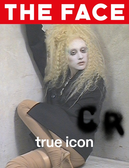 Chappell Roan on the cover of The Face. She is wearing ghostly white makeup and a blonde wig with a black coat and beige trousers