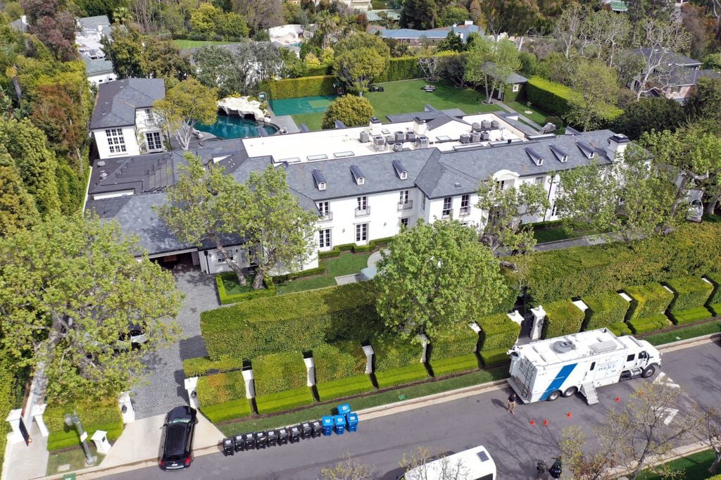 In an aerial view, the home of Sean "Diddy" Combs is seen during a raid by federal law enforcement agents on March 25, 2024 in Los Angeles, California