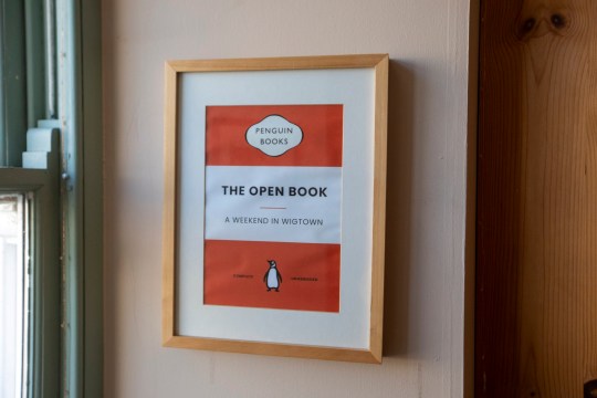 Open Book in Wigtown, Galloway, which can be booked along with it's apartment above and run as a bookshop via AirBnB. Friends Daisy Yeung and Lydia Man from Hong Kong are currently staying in the property and running the bookshop for a week. Photo released September 18 2024. Welcome to the world's only book shop Airbnb where guests spend the night - and run the store in the day.The Open Book a charming bookshop with a flat above so people can sleep upstairs and sell books downstairs.Based in Wigtown - Scotland's National Book Town - it gives book lovers the chance to ''live their dream'' of having their very own shop by the sea.Airbnb say it is ''the first ever bookshop holiday residency experience'' - and is so popular it has a two year waiting list from guests around the globe.