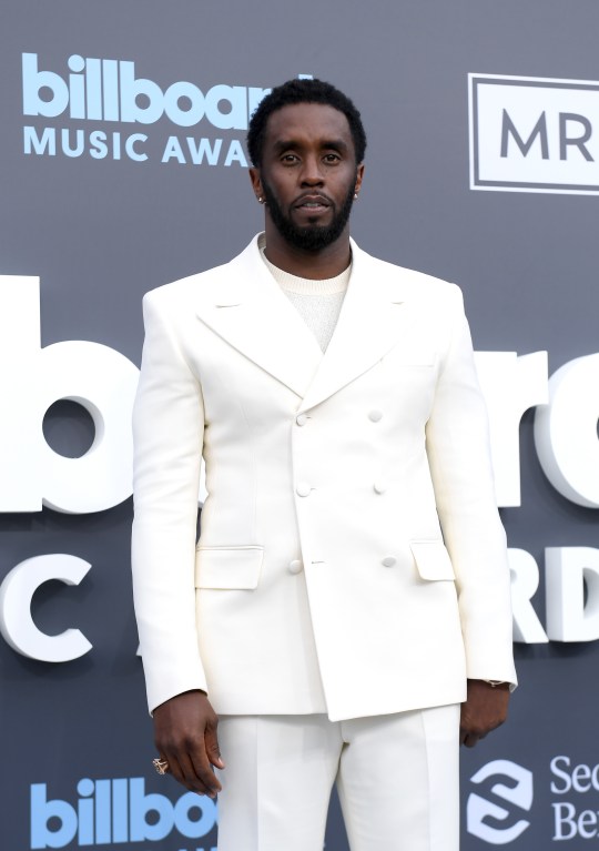 Sean 'Diddy' Combs at the Billboard Music Awards in 2022, wearing an all-white suit