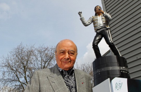 Fulham chairman Mohamed Al Fayed unveils a statue in tribute to Michael Jackson prior to the Barclays Premier League match between Fulham and Blackpoo