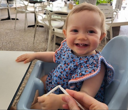 Isabelle Cooper sat in a high chair