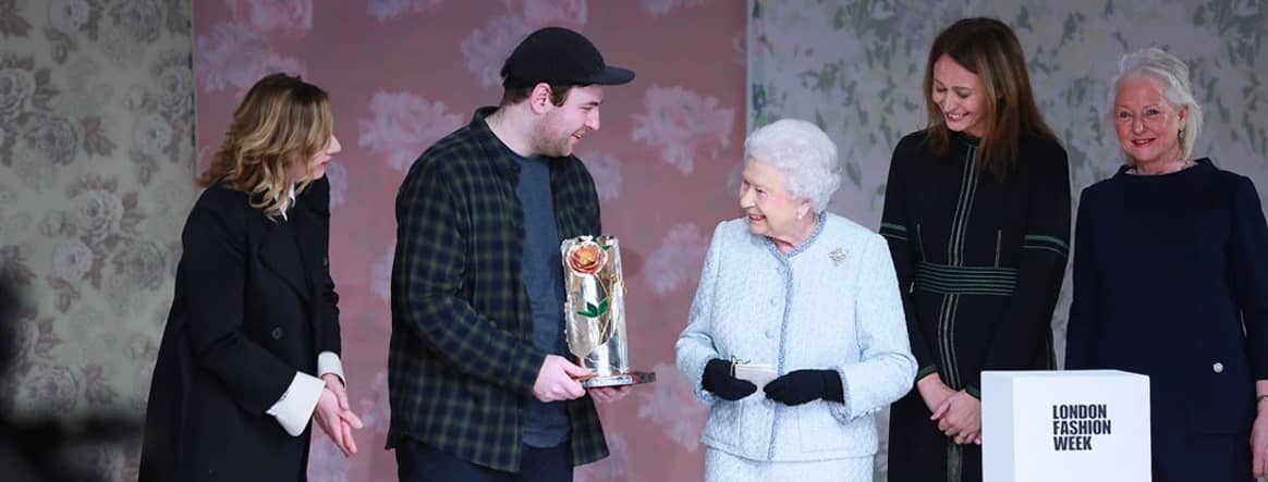 Richard Quinn receiving the Queen Elizabeth II Award at LFW.