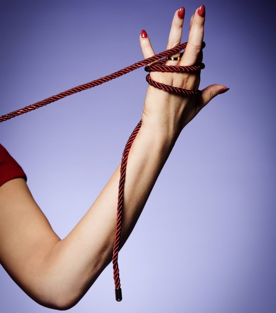 Rope between Melissa's fingers