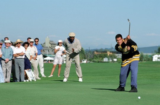 Carl Weathers coaches Adam Sandler on the golf course in a scene from Happy Gilmore