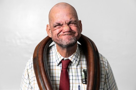 Mark Finnerty, 56, from Salford. Competitors compete in the World Gurning Championships 2024, in Cumbria. The World Gurning Chamionship is part of the Egremont Crab Fair, which first started in 1297, pictured in Cumbria,Sep 21 2024. Gurning is described as pulling a grotesque face. A typical gurn involves pushing the lower jaw as far forward and up as possible, and covering the upper lip with the lower lip. Competitors must wear a large horse collar at the same time as gurning - but the rules are generally accepted to stop there.