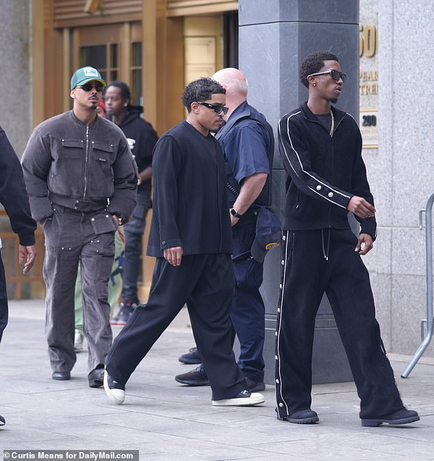 Christian, Justin, and Quincy filed into the Manhattan federal courthouse itogether to support their father last week