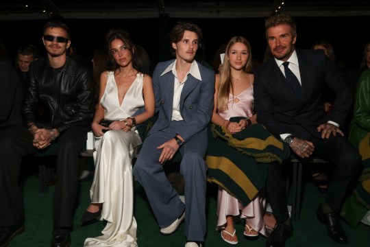 Romeo Beckham, from left, Jackie Apostel, Cruz Beckham, Harper Beckham, and David Beckham attend the Victoria Beckham fashion show