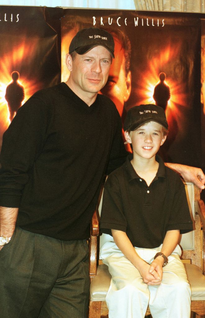 Bruce Willis with Haley Joel Osment at the preview of the film 'The Sixth Sense'.