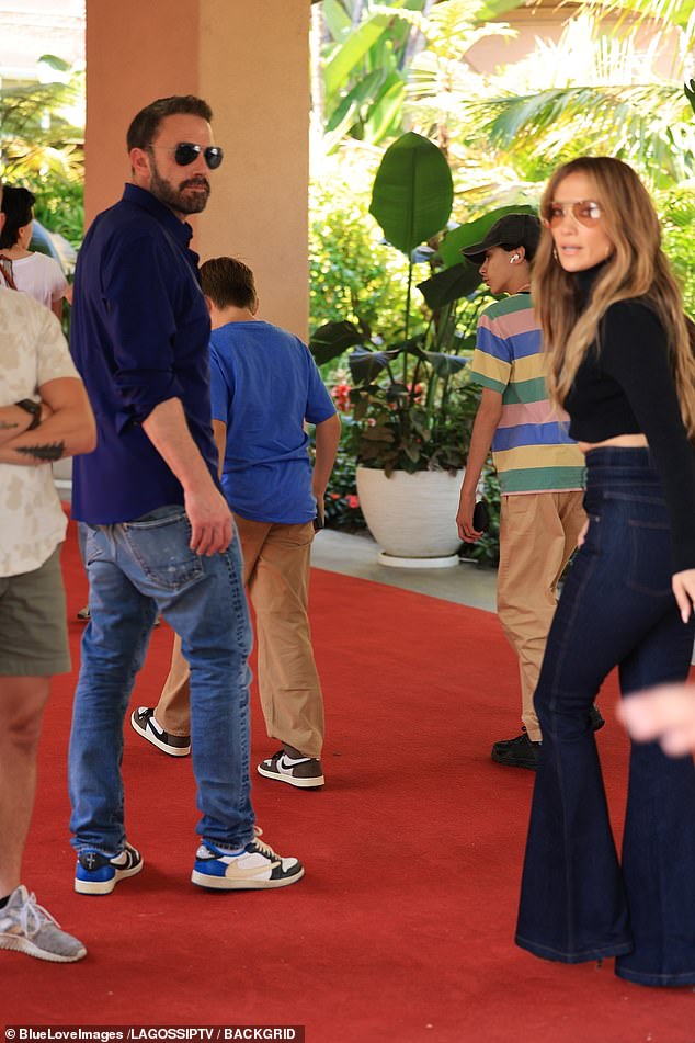 Ben Affleck and Jennifer Lopez were seen together for the first time since filing for a divorce , engaging in what appeared to be a tense conversation at the Beverly Hills Hotel on Saturday