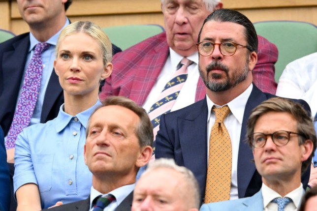 Dave Grohl and Jordyn Blum sit side-by-side at Wimbledon 2024 