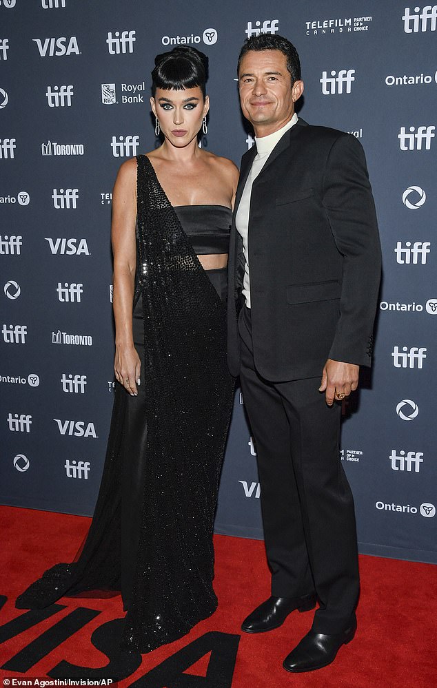 Katy Perry, 39, cozied up to fiancé Orlando Bloom, 47, at the premiere of his movie, The Cut, on Thursday, during the 2024 Toronto International Film Festival in Ontario