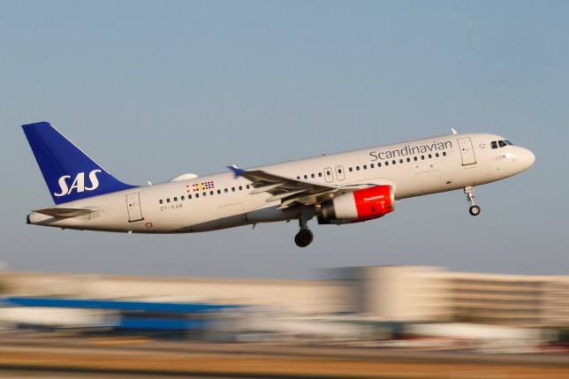  A Scandanavian Airlines plane takes-off