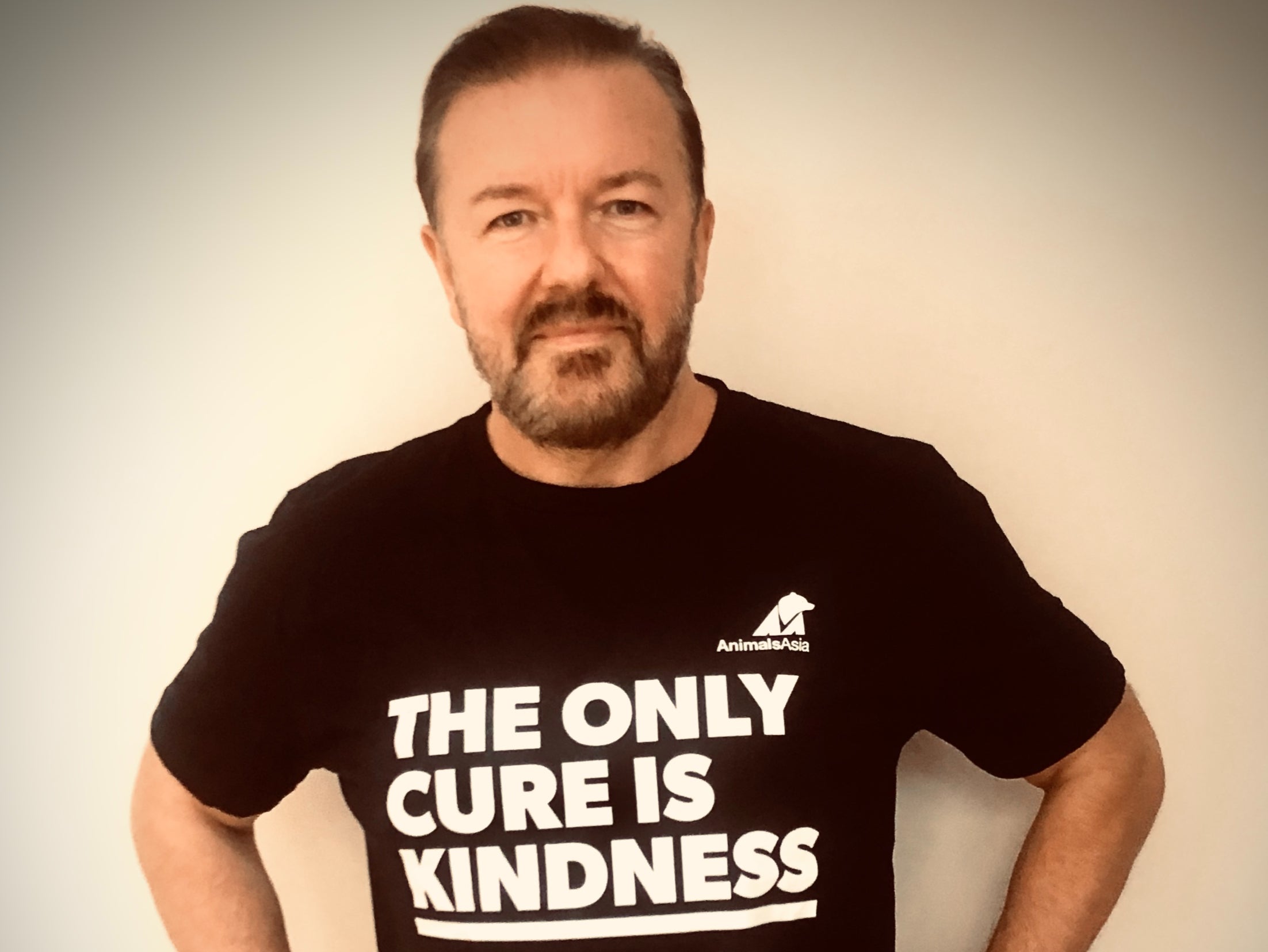 Ricky Gervais in T-shirt with ‘kindness’ slogan