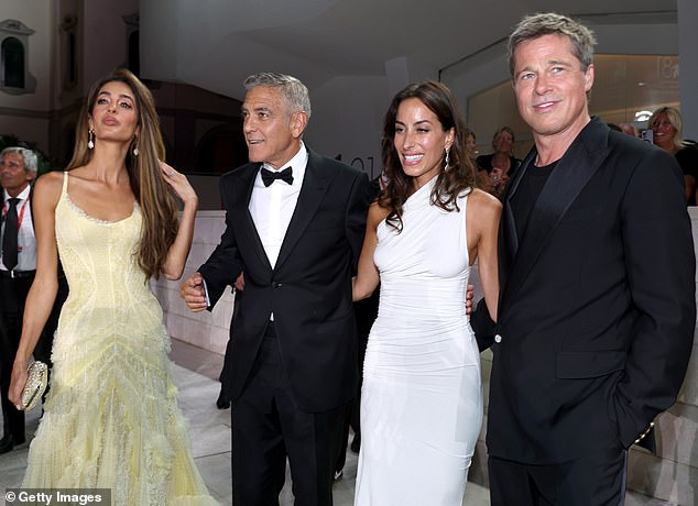 Amal Clooney, George Clooney, Ines de Ramon and Brad Pitt attend the Wolfs red carpet during the Venice Film Festival on September 1