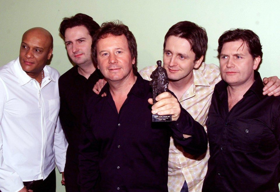 Simple Minds drummer Kenny Hyslop (second from right) has sadly died