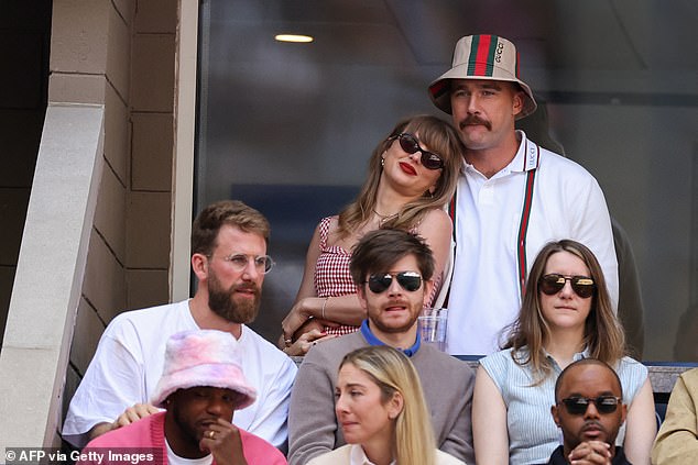 Taylor Swift and Travis Kelce defied fake romance rumours as they put on a loved-up display at the US Open final together in New York City on Sunday