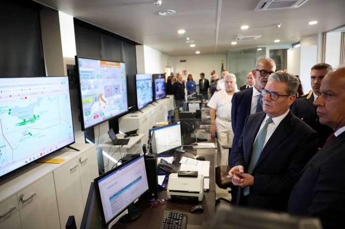 Prime Minister Sir Keir Starmer looks at screens showing the maritime traffic off the Italian coast during his visit to the National Coordination Centre in Rome, Italy. 