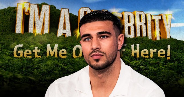 Tommy Fury in front of the I'm A Celebrity logo.