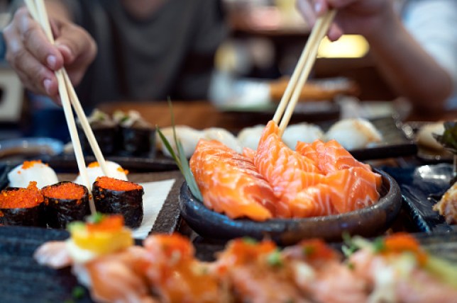 Salmon fish sashimi and Sushi in Japanese restaurant