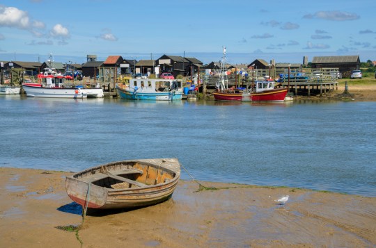 A boat by a river in Walberswick, Suffolk.