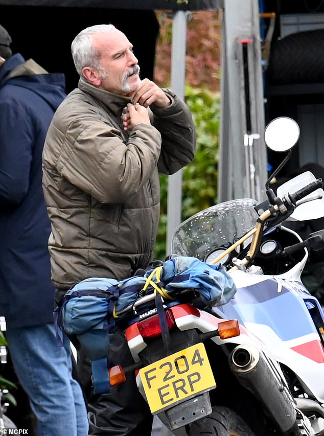 The three times Oscar winner Daniel Day Lewis looked unrecognisable with beard and moustache as he was filmed riding a motorbike earlier in the week